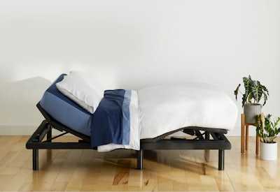 Adjustable Pro Bed Frame with head and feet raised. Free in-home setup.